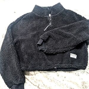 Fluffy warm black pullover teddy jacket. Sits at the waist. Excellent condition!